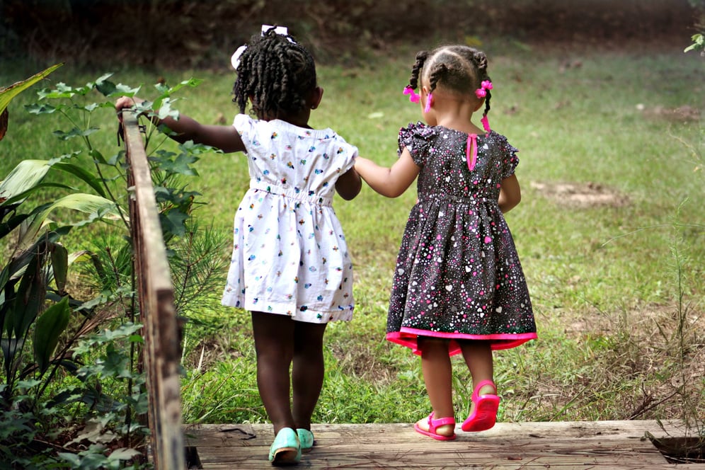 Little Girls Walking Together